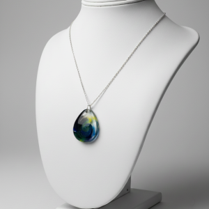Handcrafted Teardrop Resin Necklace: Deep Ocean Blue, Black, and Yellow Abstract Swirl